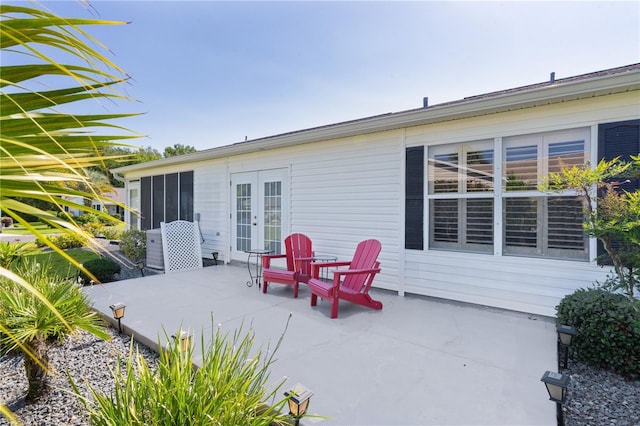 2785 Privada Dr, The Villages, FL 32162 - view of patio / terrace featuring french doors