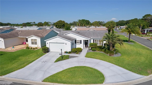 2785 Privada Dr, The Villages, FL 32162 - ranch-style house featuring concrete driveway, a residential view, a garage, and a front yard