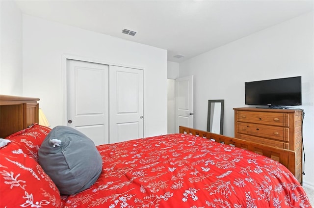 33960 Sky Blossom Cir, Leesburg, FL 34788 - bedroom featuring a closet and carpet flooring