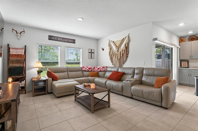 33960 Sky Blossom Cir, Leesburg, FL 34788 - living room with light tile patterned floors and recessed lighting
