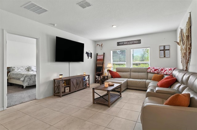 33960 Sky Blossom Cir, Leesburg, FL 34788 - living area with light tile patterned floors