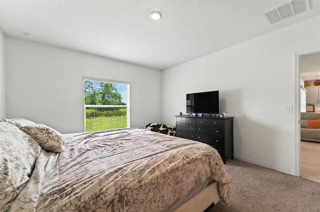 33960 Sky Blossom Cir, Leesburg, FL 34788 - carpeted bedroom featuring baseboards