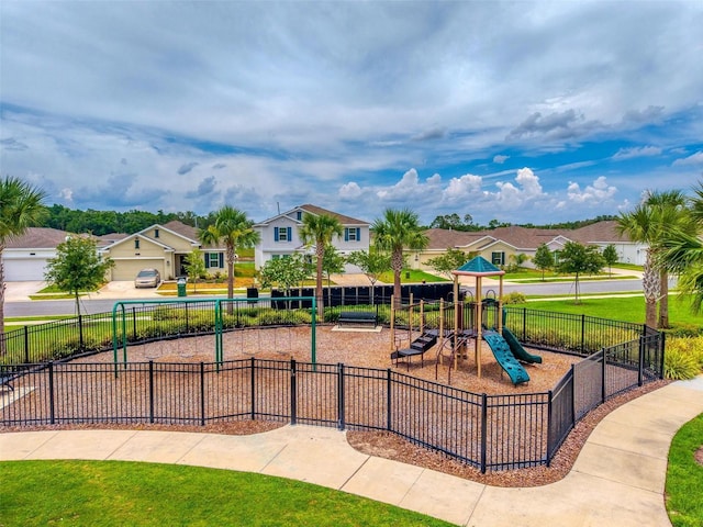 33960 Sky Blossom Cir, Leesburg, FL 34788 - community playground featuring a residential view