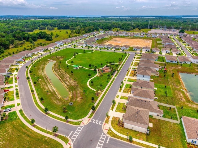 33960 Sky Blossom Cir, Leesburg, FL 34788 - aerial view of residential area featuring a large body of water
