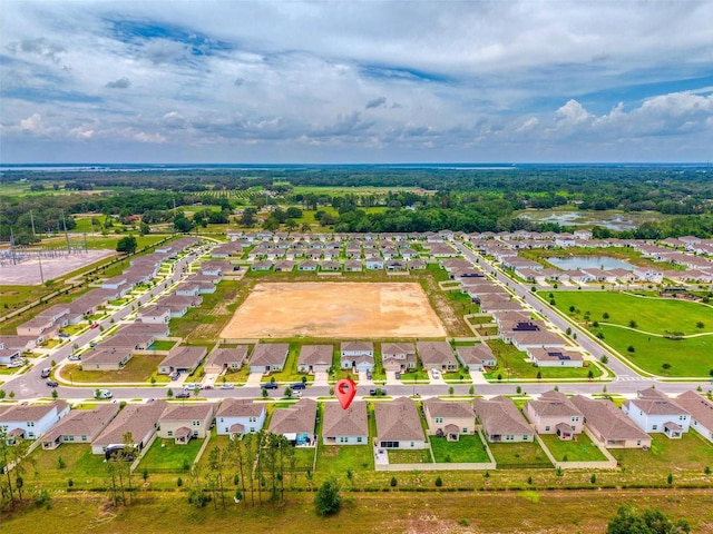 33960 Sky Blossom Cir, Leesburg, FL 34788 - aerial view of residential area featuring a nearby body of water