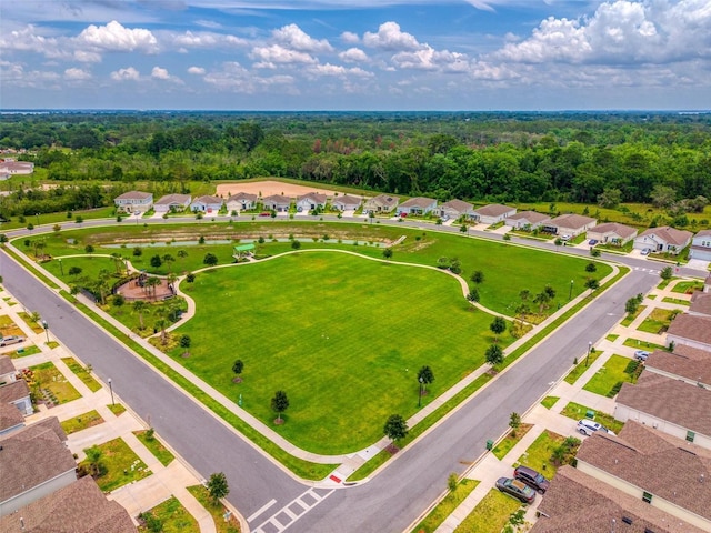 33960 Sky Blossom Cir, Leesburg, FL 34788 - aerial perspective of suburban area featuring a forest