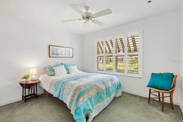 654 Fayette Ct, The Villages, FL 32162 - carpeted bedroom featuring baseboards and a ceiling fan