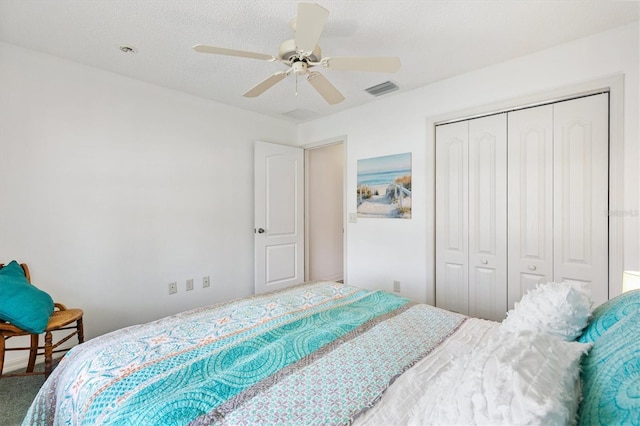 654 Fayette Ct, The Villages, FL 32162 - bedroom featuring a closet and ceiling fan