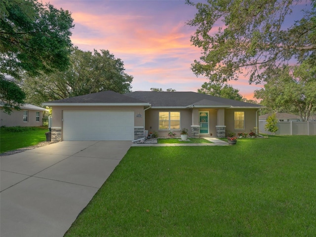9364 SE 164th Pl, Summerfield, FL 34491 - ranch-style home with an attached garage, concrete driveway, and stucco siding