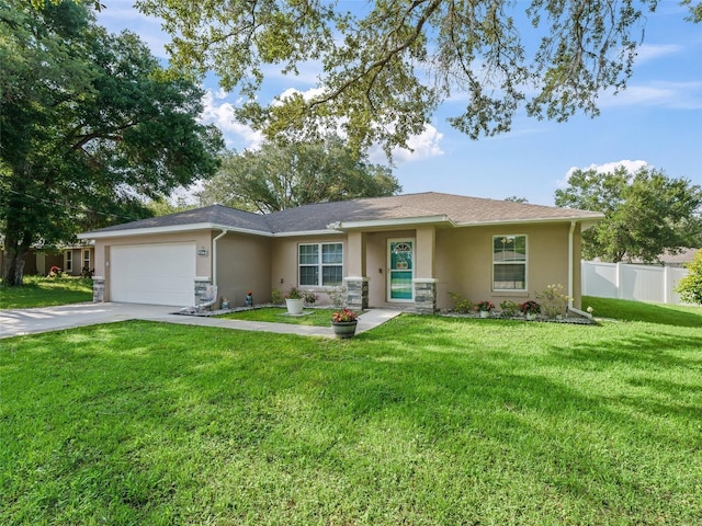 9364 SE 164th Pl, Summerfield, FL 34491 - ranch-style home featuring stucco siding, a garage, driveway, and stone siding