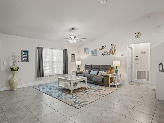 9364 SE 164th Pl, Summerfield, FL 34491 - living room with ceiling fan, light tile patterned floors, baseboards, and vaulted ceiling