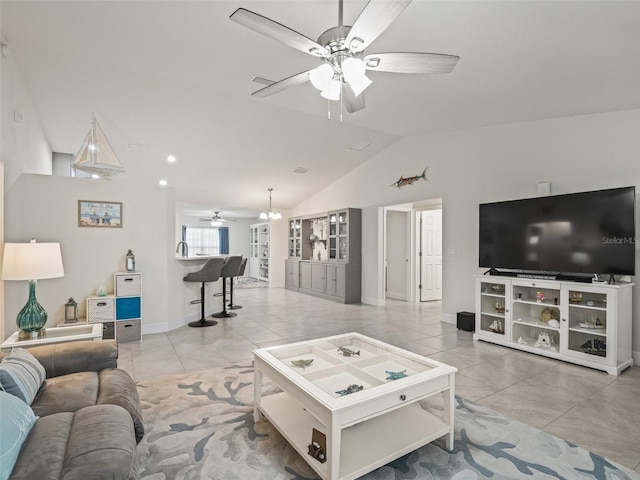 9364 SE 164th Pl, Summerfield, FL 34491 - living room featuring a ceiling fan, vaulted ceiling, and baseboards