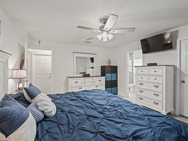 9364 SE 164th Pl, Summerfield, FL 34491 - bedroom with a ceiling fan, ensuite bath, and light tile patterned floors