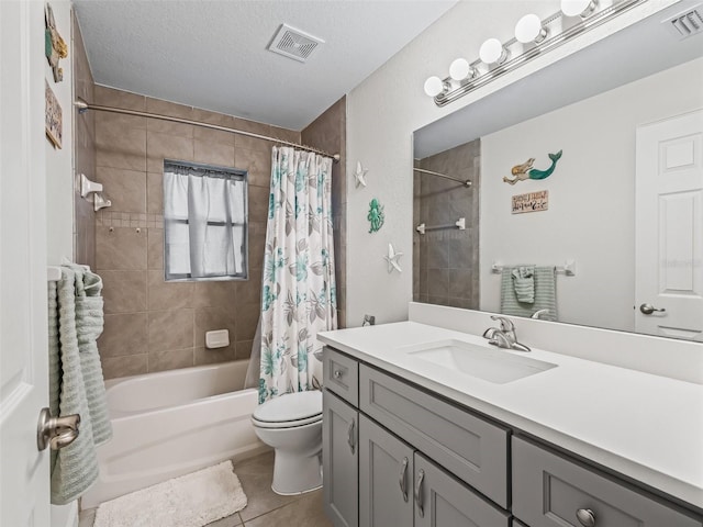 9364 SE 164th Pl, Summerfield, FL 34491 - full bathroom with shower / bath combo, toilet, tile patterned flooring, vanity, and a textured ceiling