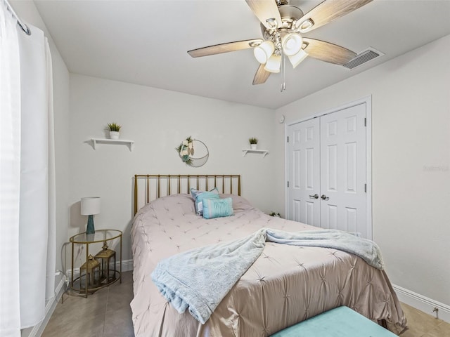 9364 SE 164th Pl, Summerfield, FL 34491 - bedroom with baseboards, a closet, and ceiling fan