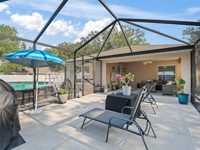9364 SE 164th Pl, Summerfield, FL 34491 - view of patio / terrace with an outdoor living space, ceiling fan, and glass enclosure