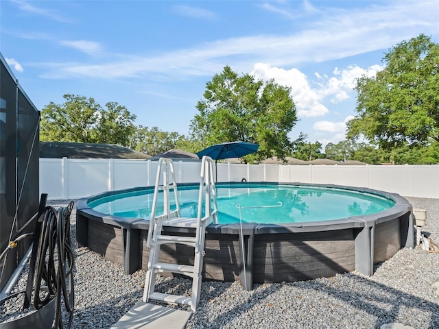 9364 SE 164th Pl, Summerfield, FL 34491 - view of pool with a fenced backyard