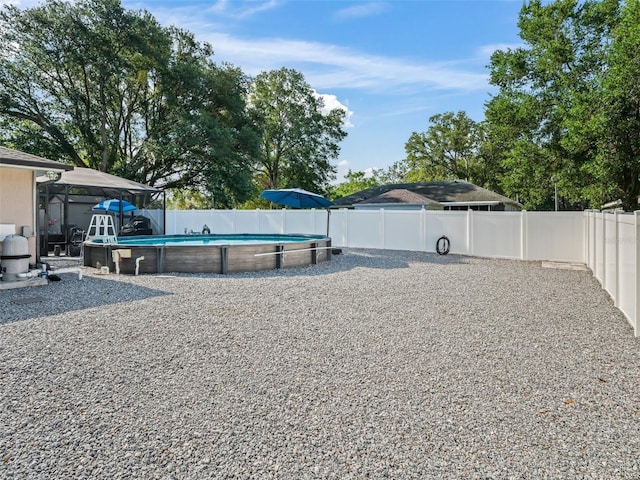 9364 SE 164th Pl, Summerfield, FL 34491 - view of swimming pool featuring a fenced backyard