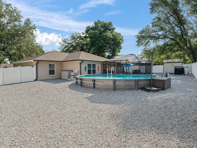 9364 SE 164th Pl, Summerfield, FL 34491 - view of swimming pool featuring a fenced backyard