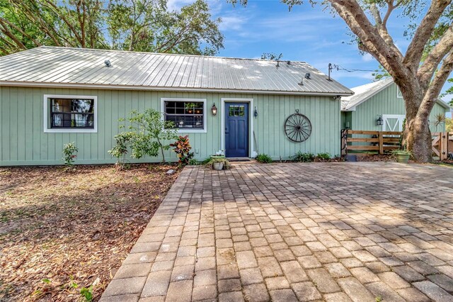 10330 Dwights Rd, Clermont, FL 34714 - single story home with metal roof