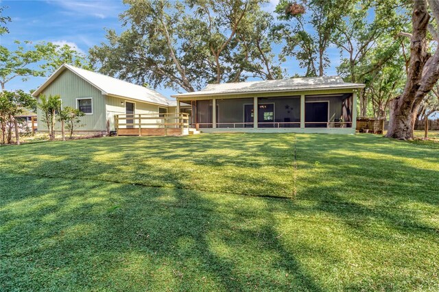 10330 Dwights Rd, Clermont, FL 34714 - rear view of property featuring a sunroom