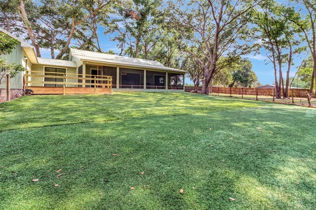 10330 Dwights Rd, Clermont, FL 34714 - view of yard featuring a sunroom