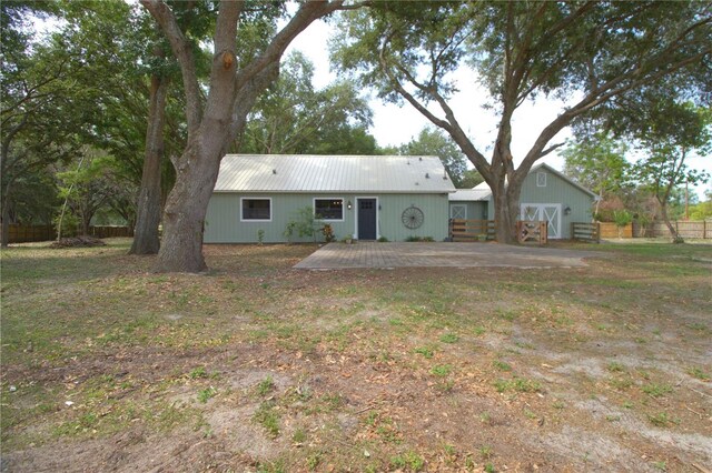 10330 Dwights Rd, Clermont, FL 34714 - single story home featuring metal roof
