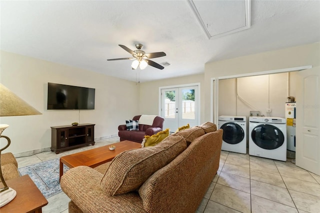 40140 Palm St, Lady Lake, FL 32159 - living area featuring washer and clothes dryer, electric water heater, attic access, a ceiling fan, and light tile patterned floors