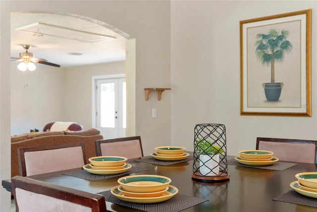 40140 Palm St, Lady Lake, FL 32159 - dining space featuring arched walkways and a ceiling fan