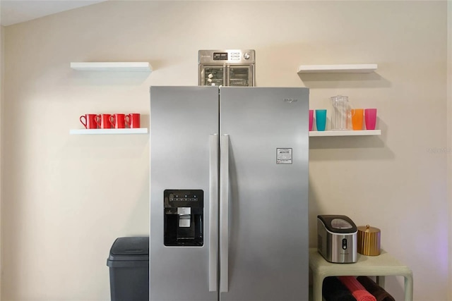 40140 Palm St, Lady Lake, FL 32159 - kitchen featuring stainless steel fridge with ice dispenser and open shelves