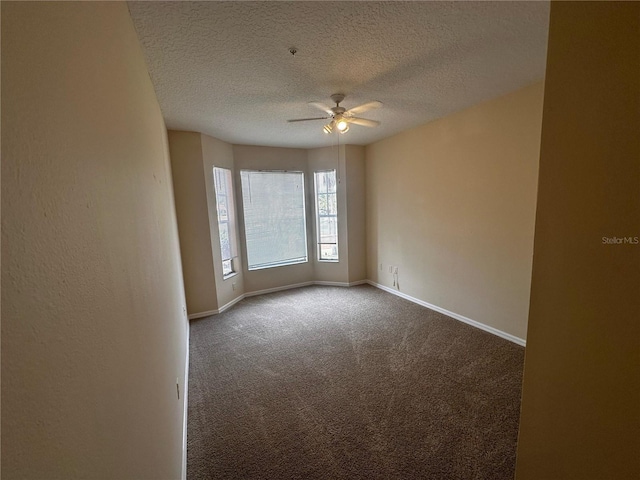 5560 Metrowest Blvd Unit 3-204, Orlando, FL 32811 - carpeted empty room with a ceiling fan, a textured ceiling, and baseboards