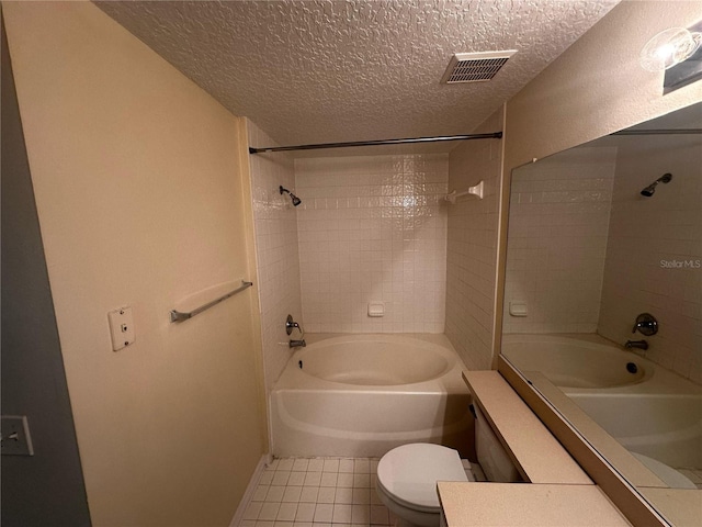 5560 Metrowest Blvd Unit 3-204, Orlando, FL 32811 - bathroom featuring a textured ceiling, toilet, shower / tub combination, vanity, and tile patterned floors