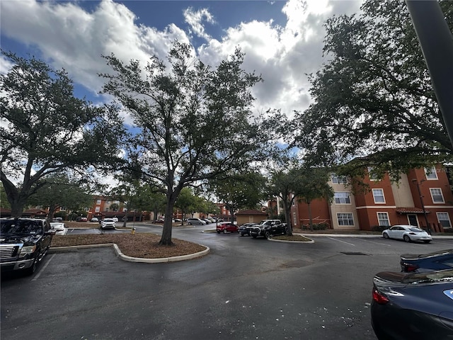 5560 Metrowest Blvd Unit 3-204, Orlando, FL 32811 - view of asphalt street with curbs