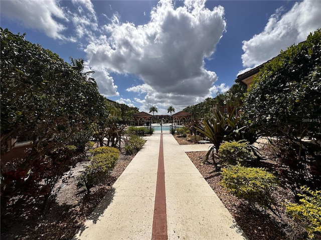 5560 Metrowest Blvd Unit 3-204, Orlando, FL 32811 - surrounding community featuring a swimming pool