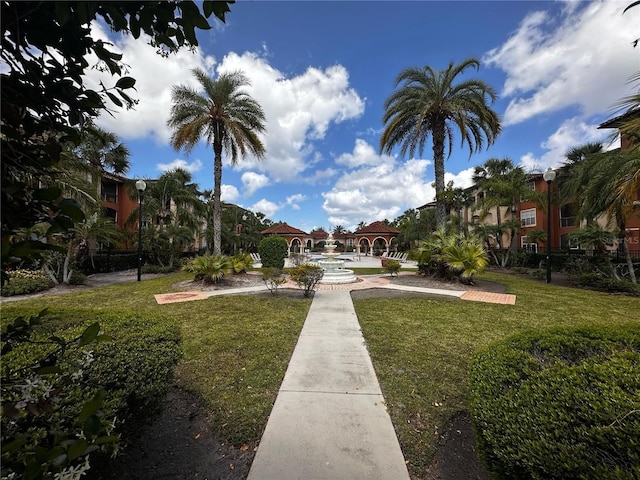 5560 Metrowest Blvd Unit 3-204, Orlando, FL 32811 - view of property's community featuring a yard