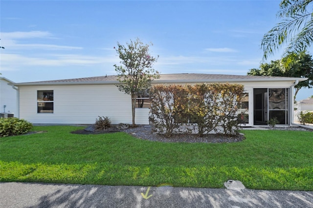 2111 Thornton Ter, The Villages, FL 32162 - ranch-style home with a front yard, a sunroom, and central air condition unit