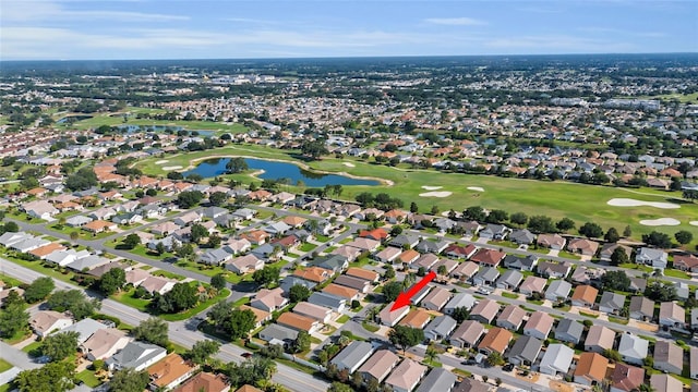 2111 Thornton Ter, The Villages, FL 32162 - view of property location featuring a golf course, a large body of water, and nearby suburban area