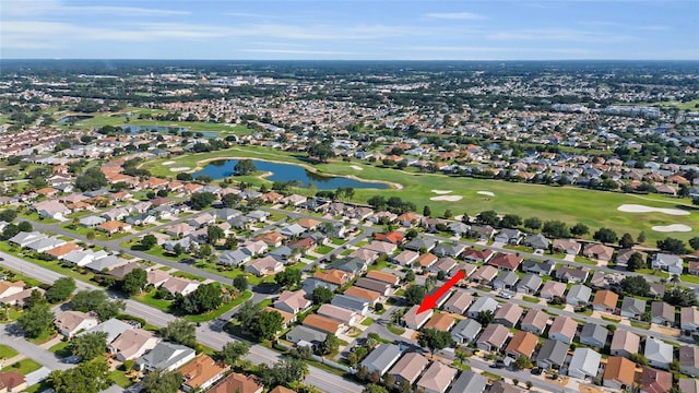 2111 Thornton Ter, The Villages, FL 32162 - aerial view of property's location featuring a golf course, a nearby body of water, and nearby suburban area
