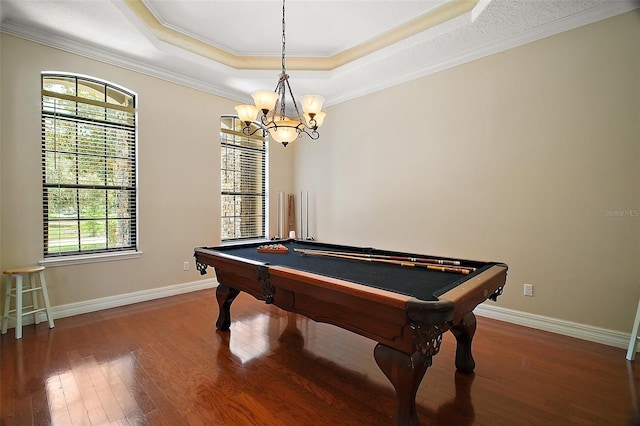 21206 Canoe Pass St, Clermont, FL 34715 - game room with a tray ceiling, ornamental molding, wood finished floors, a chandelier, and billiards table