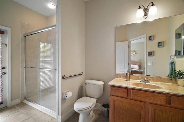 21206 Canoe Pass St, Clermont, FL 34715 - full bath with ensuite bathroom, vanity, a shower stall, tile patterned flooring, and toilet