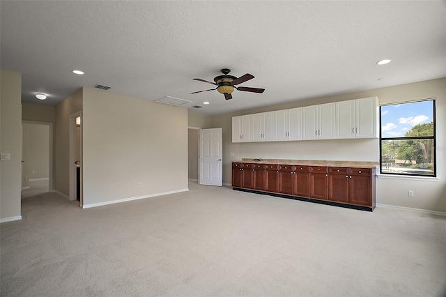 21206 Canoe Pass St, Clermont, FL 34715 - unfurnished living room featuring baseboards, recessed lighting, light colored carpet, and ceiling fan