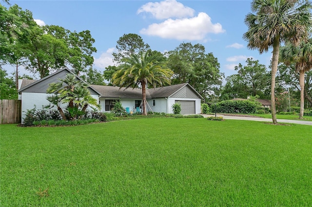 717 SE 46th Ct, Ocala, FL 34471 - ranch-style house featuring concrete driveway and an attached garage