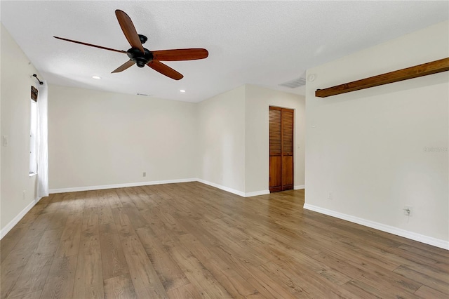 717 SE 46th Ct, Ocala, FL 34471 - unfurnished room featuring a ceiling fan, wood finished floors, and recessed lighting