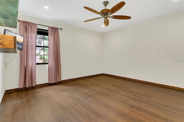 717 SE 46th Ct, Ocala, FL 34471 - spare room featuring wood finished floors, ceiling fan, and recessed lighting