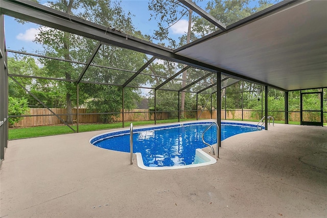 717 SE 46th Ct, Ocala, FL 34471 - view of swimming pool featuring a patio area, a fenced backyard, and a lanai