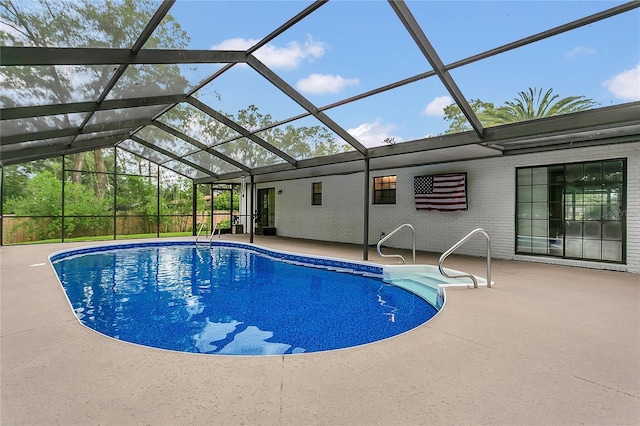 717 SE 46th Ct, Ocala, FL 34471 - outdoor pool featuring a patio area and a lanai