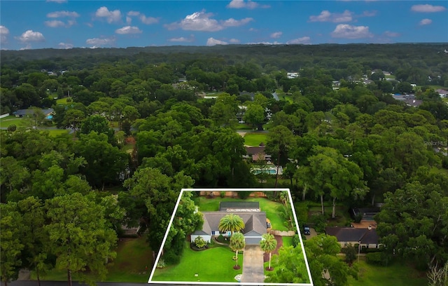 717 SE 46th Ct, Ocala, FL 34471 - aerial view of property's location featuring a heavily wooded area and property parcel outlined
