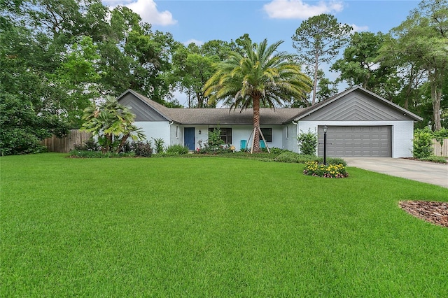 717 SE 46th Ct, Ocala, FL 34471 - single story home featuring driveway and a garage