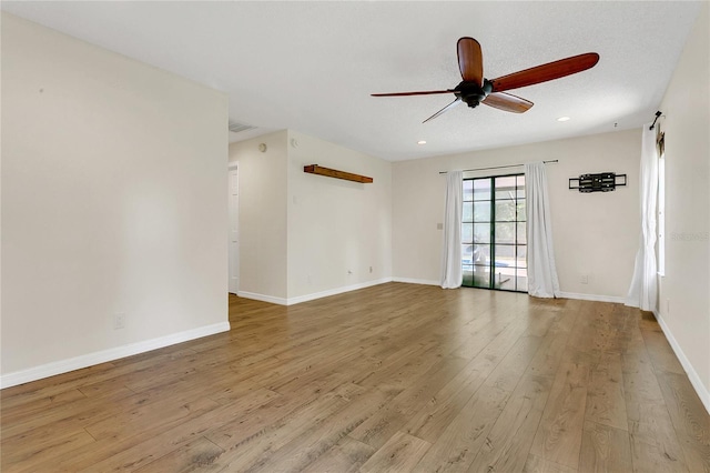 717 SE 46th Ct, Ocala, FL 34471 - unfurnished room with ceiling fan, light wood-style floors, and recessed lighting