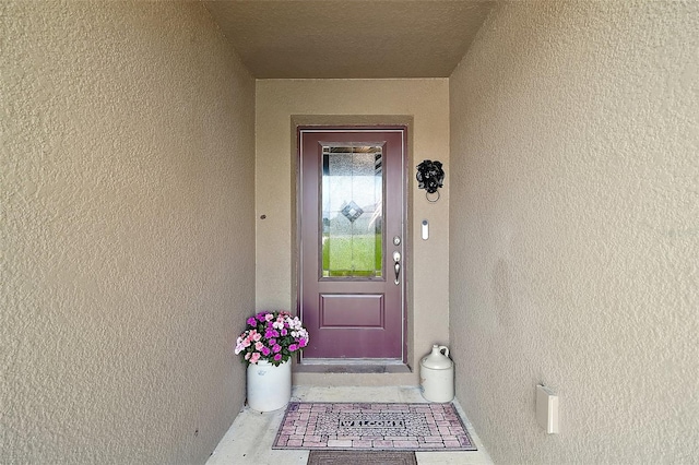 12952 Del Lago Dr, Astatula, FL 34705 - property entrance featuring stucco siding